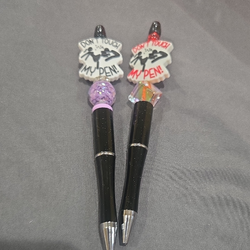 Black Pens with Decorative Tops